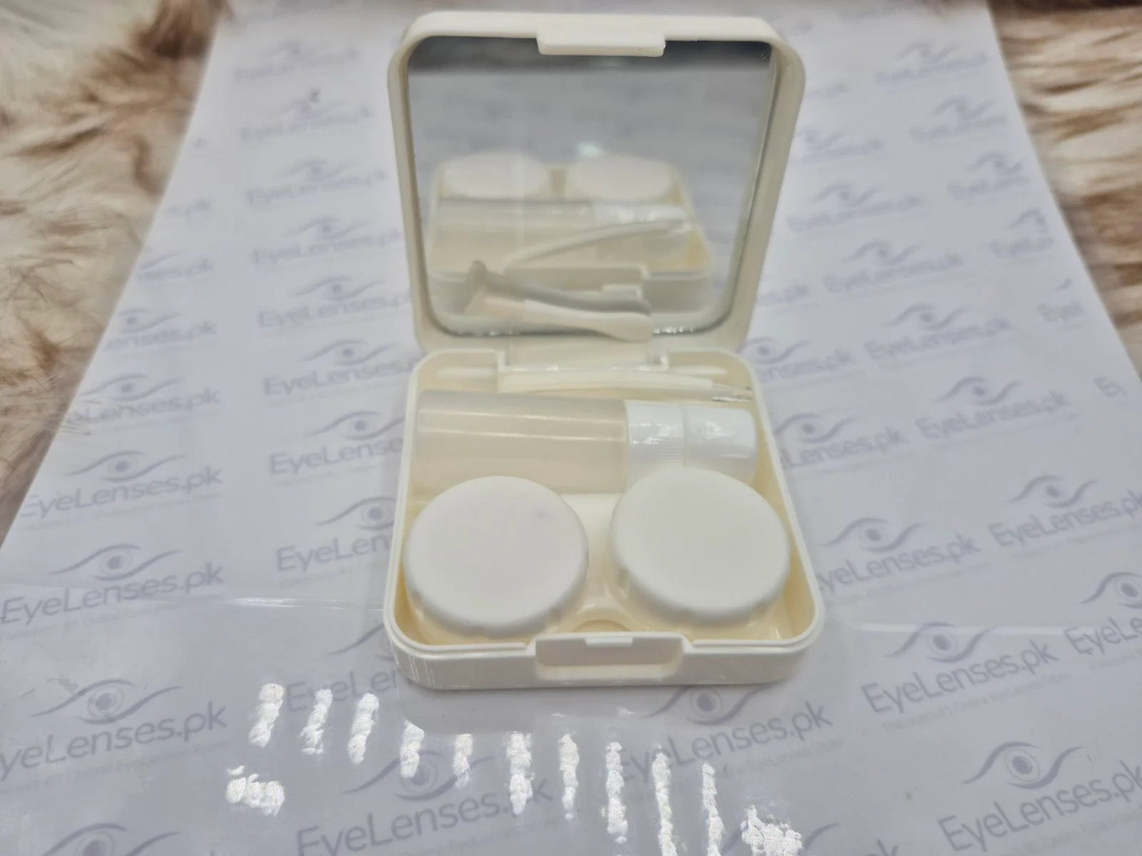 LENS SET CASING